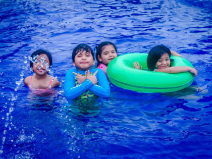 Kids having fun in the pool